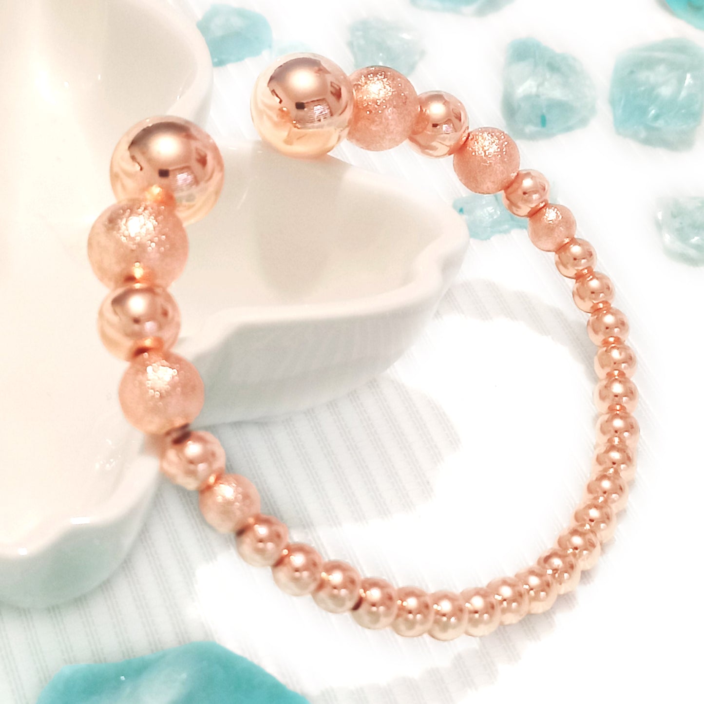 Pulsera esferas color rosa perla